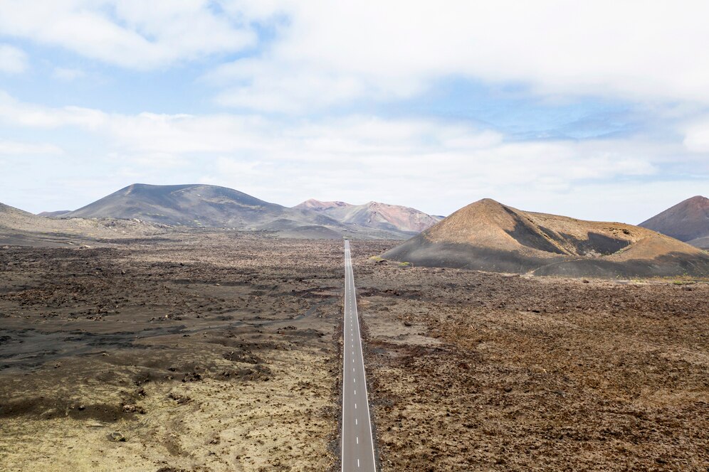 avatar freepik Follow Aerial view of straight road